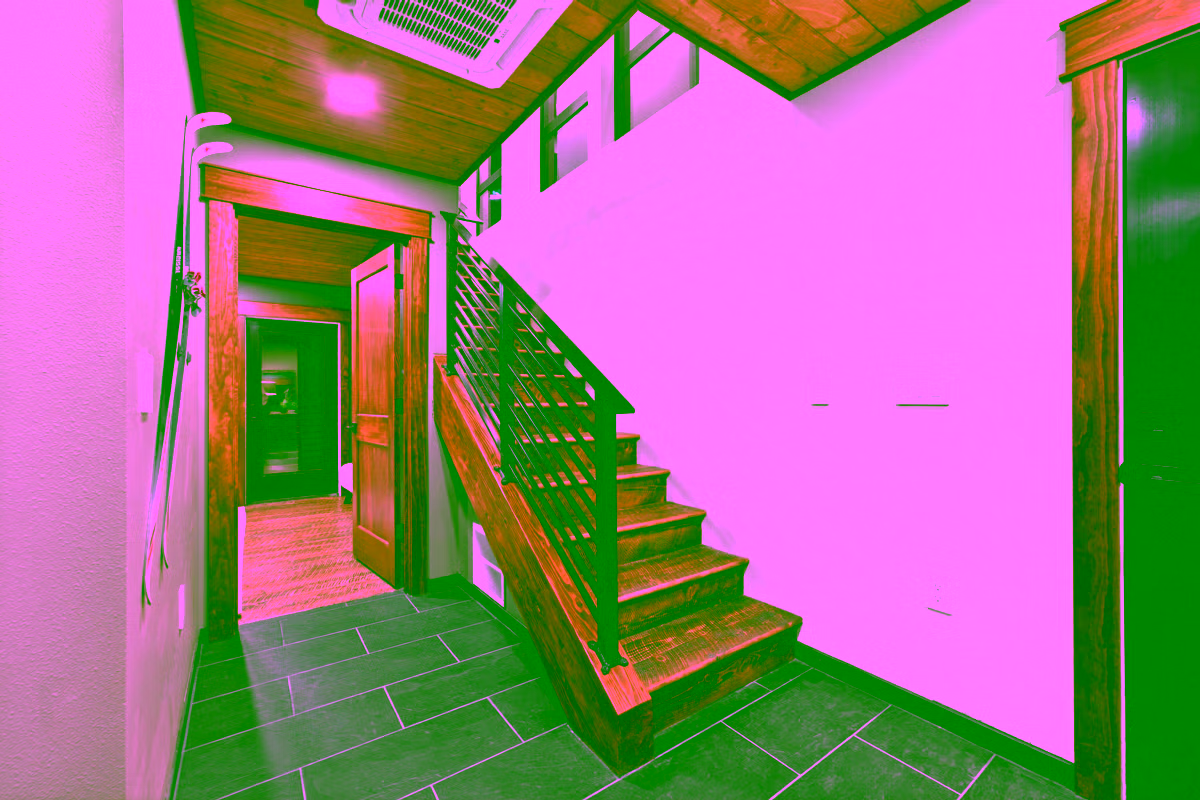 Entry staircase with wood treads, metal railings, and wood ceiling