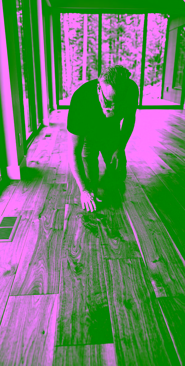 Randy Van Dyke working on a hardwood floor installation